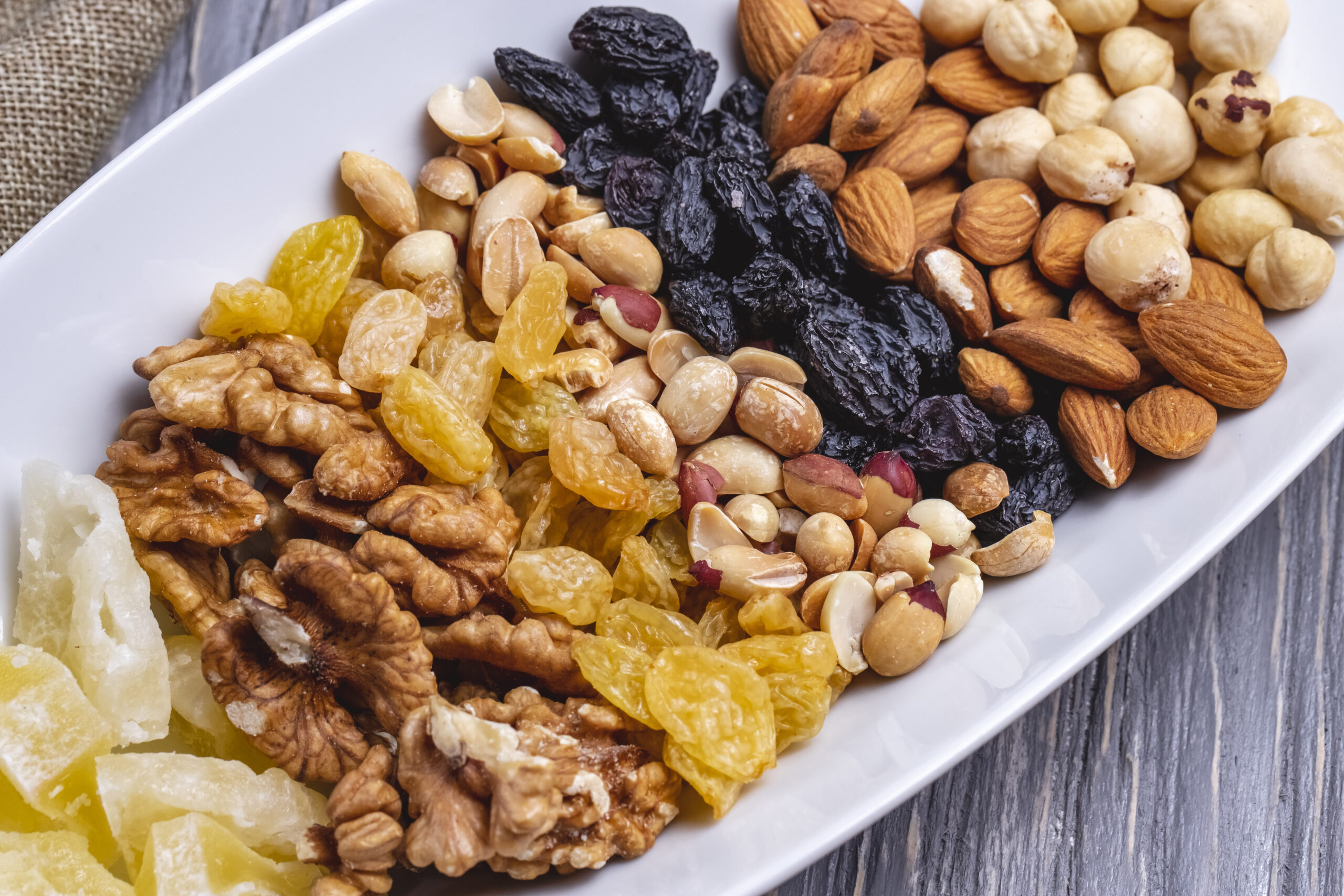 top view mix nuts walnuts raisins peanuts and almonds